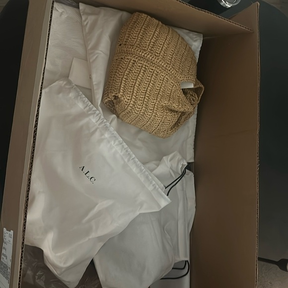 ALC dust bags and 5 sweaters in large box - Picture 1 of 2